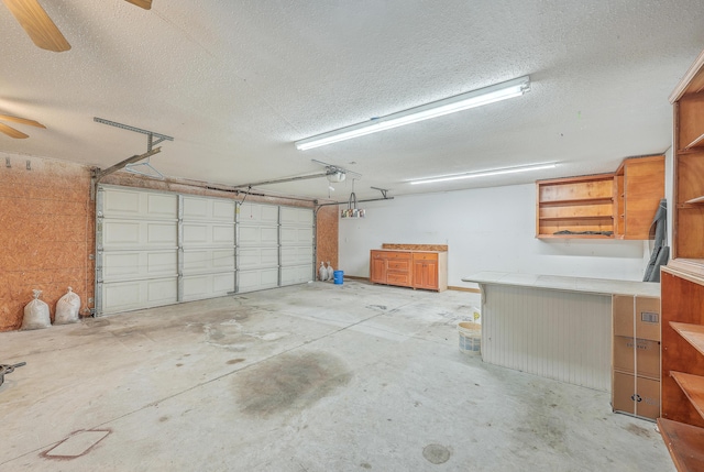 garage featuring ceiling fan