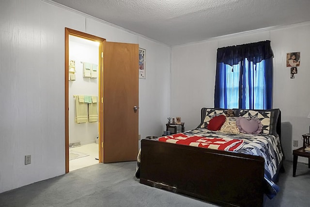 2363 Ranger Dr, Cross, SC 29436 - carpeted bedroom with crown molding, ensuite bathroom, and a textured ceiling