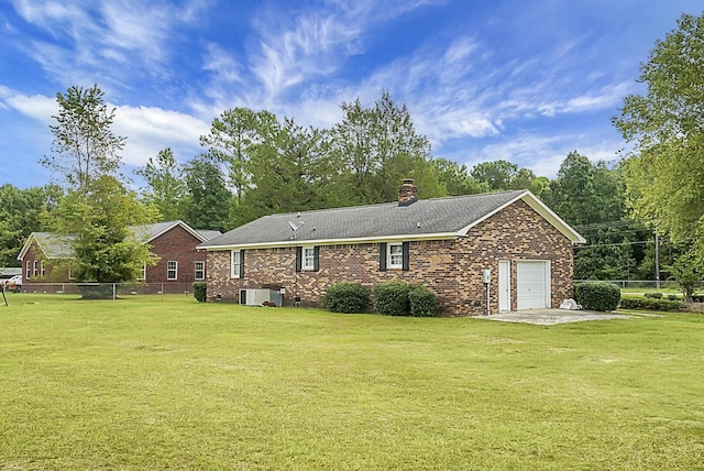 2363 Ranger Dr, Cross, SC 29436 - back of house with a garage, a chimney, brick siding, and central air condition unit