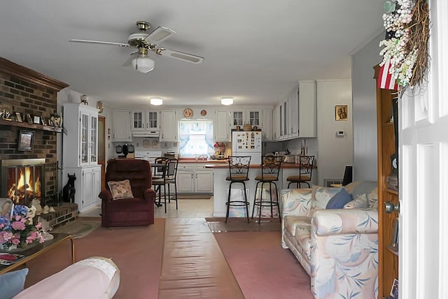 2363 Ranger Dr, Cross, SC 29436 - living area with ceiling fan and a brick fireplace