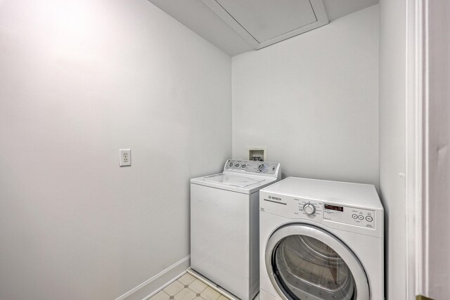 2028 Prospect Hill Dr, Mount Pleasant, SC 29464 - laundry room featuring separate washer and dryer and baseboards