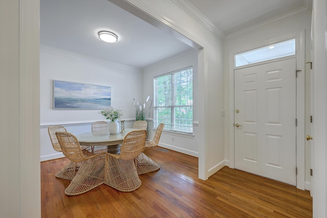 2028 Prospect Hill Dr, Mount Pleasant, SC 29464 - dining area with wood finished floors, ornamental molding, and baseboards