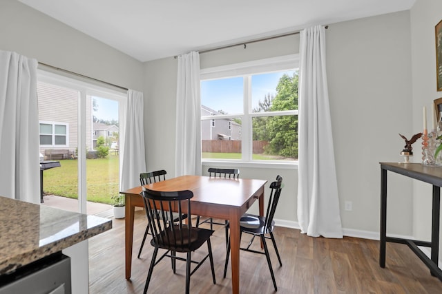 725 Pepperbush St, Charleston, SC 29414 - dining space with dark wood-style flooring and baseboards