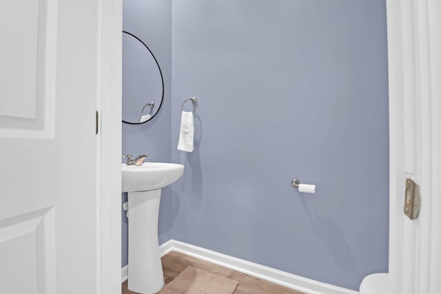 725 Pepperbush St, Charleston, SC 29414 - half bathroom with wood finished floors and baseboards