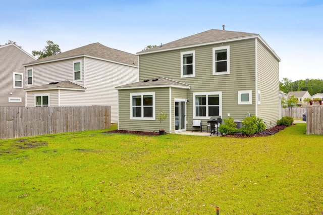 725 Pepperbush St, Charleston, SC 29414 - back of property with a patio area and roof with shingles