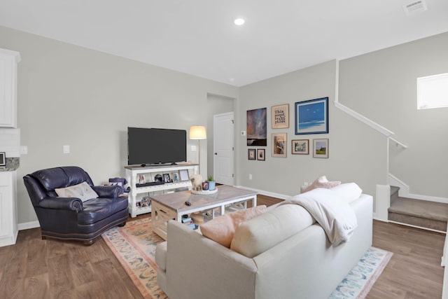 725 Pepperbush St, Charleston, SC 29414 - living room featuring wood finished floors, stairs, baseboards, and recessed lighting