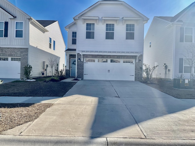 515 Purple Finch Rd, Summerville, SC 29486 - traditional-style home with driveway, central air condition unit, an attached garage, and brick siding