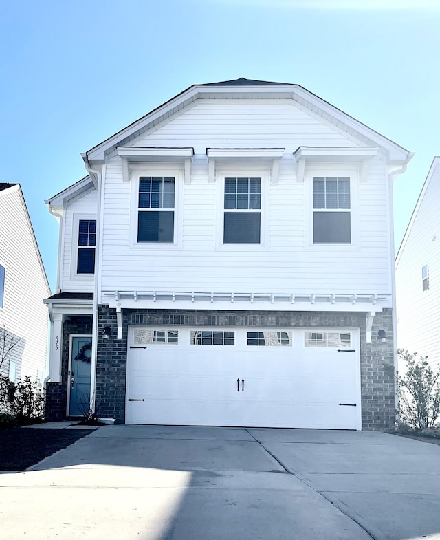 515 Purple Finch Rd, Summerville, SC 29486 - view of front facade with a garage, concrete driveway, and brick siding