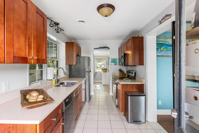 532 Sunset Dr, Charleston, SC 29407 - kitchen with appliances with stainless steel finishes, a sink, light countertops, and light tile patterned flooring