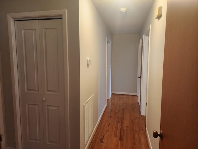 hall featuring hardwood / wood-style flooring