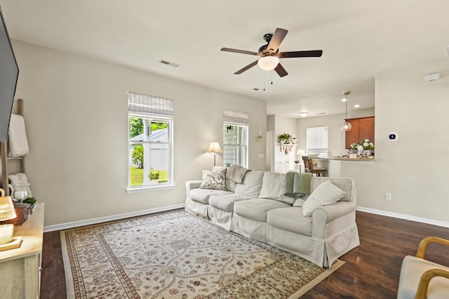 243 Old Savannah Dr, Goose Creek, SC 29445 - living room featuring ceiling fan, dark wood finished floors, and baseboards