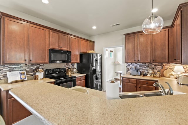 243 Old Savannah Dr, Goose Creek, SC 29445 - kitchen featuring black appliances, a sink, light countertops, and recessed lighting