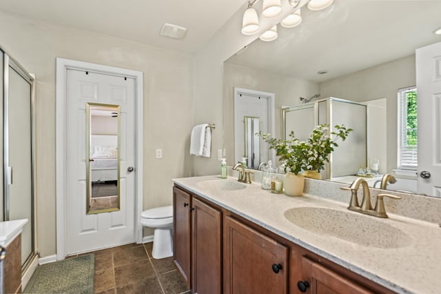 243 Old Savannah Dr, Goose Creek, SC 29445 - ensuite bathroom with a stall shower, double vanity, toilet, and baseboards