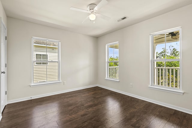 243 Old Savannah Dr, Goose Creek, SC 29445 - spare room featuring a ceiling fan, plenty of natural light, dark wood-style floors, and baseboards