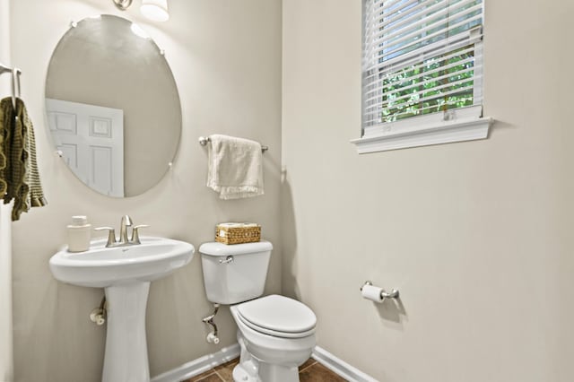 243 Old Savannah Dr, Goose Creek, SC 29445 - bathroom featuring toilet, baseboards, and tile patterned flooring