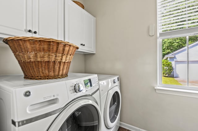 243 Old Savannah Dr, Goose Creek, SC 29445 - laundry area with washing machine and dryer, cabinet space, and baseboards