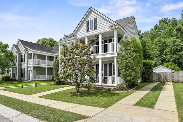 243 Old Savannah Dr, Goose Creek, SC 29445 - view of front of house with a balcony, covered porch, ceiling fan, and a shingled roof
