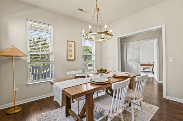 243 Old Savannah Dr, Goose Creek, SC 29445 - dining area with a chandelier, baseboards, and dark wood-type flooring
