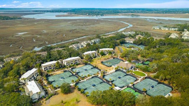 drone / aerial view featuring a residential view and a water view