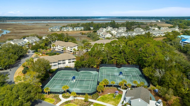 birds eye view of property featuring a water view and a residential view