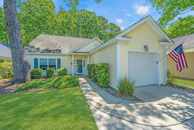 2418 Tuscany Dr, North Charleston, SC 29406 - single story home featuring a garage, concrete driveway, and a front yard