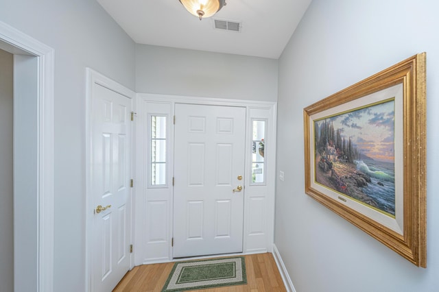2418 Tuscany Dr, North Charleston, SC 29406 - entrance foyer with light wood-style floors, baseboards, plenty of natural light, and visible vents