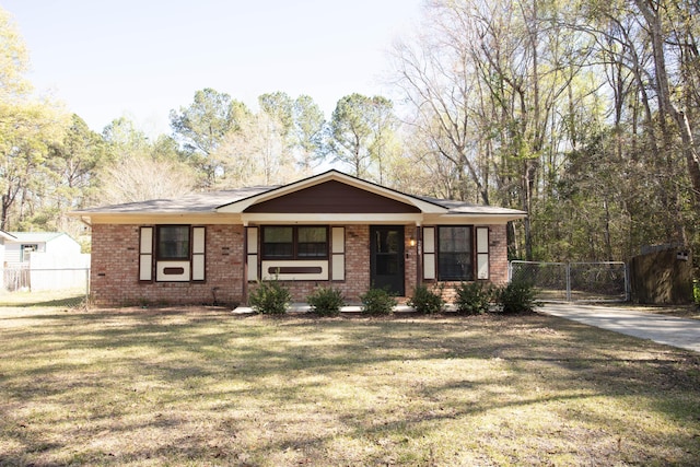 208 Owens Dr, Summerville, SC 29485 - view of front of property featuring brick siding, a front lawn, and fence
