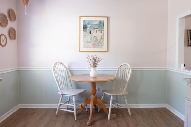 208 Owens Dr, Summerville, SC 29485 - dining room featuring wainscoting and wood finished floors