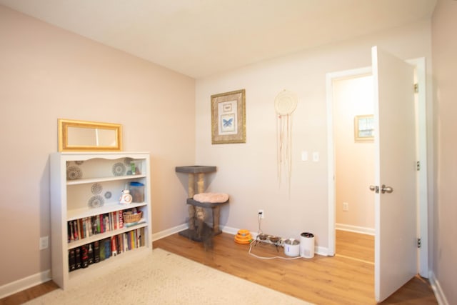 208 Owens Dr, Summerville, SC 29485 - recreation room featuring baseboards and wood finished floors