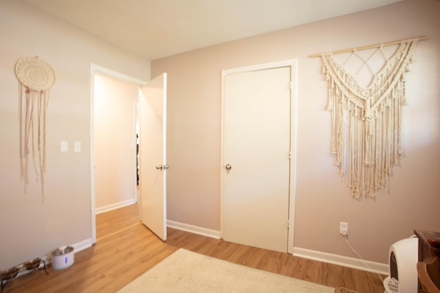 208 Owens Dr, Summerville, SC 29485 - unfurnished bedroom featuring baseboards and wood finished floors