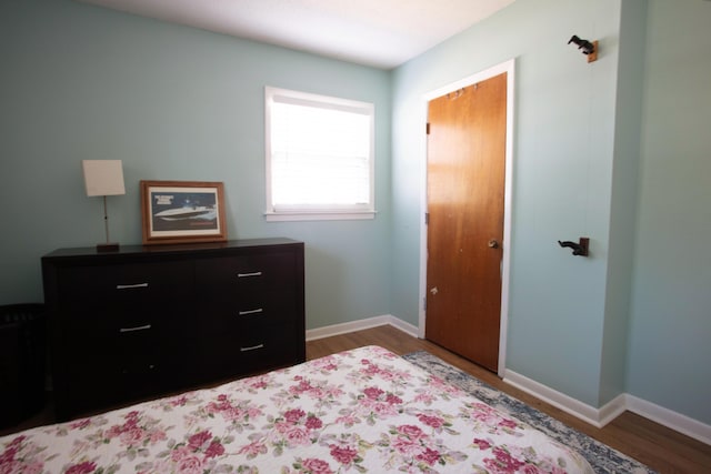 208 Owens Dr, Summerville, SC 29485 - bedroom with baseboards and wood finished floors
