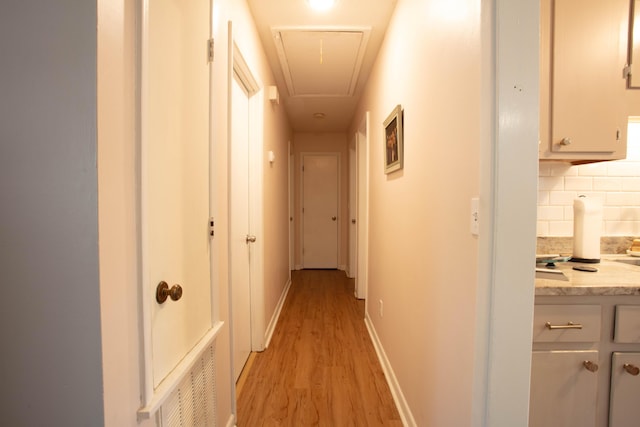 208 Owens Dr, Summerville, SC 29485 - hall with baseboards, visible vents, light wood-type flooring, and attic access