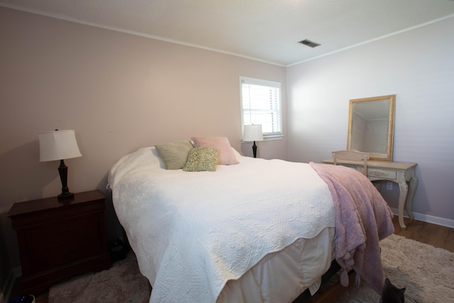 208 Owens Dr, Summerville, SC 29485 - bedroom featuring ornamental molding, visible vents, baseboards, and wood finished floors