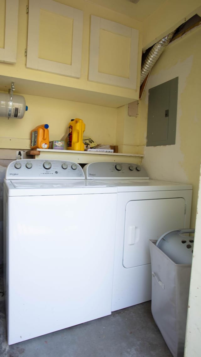 208 Owens Dr, Summerville, SC 29485 - washroom featuring electric panel, washing machine and clothes dryer, and cabinet space