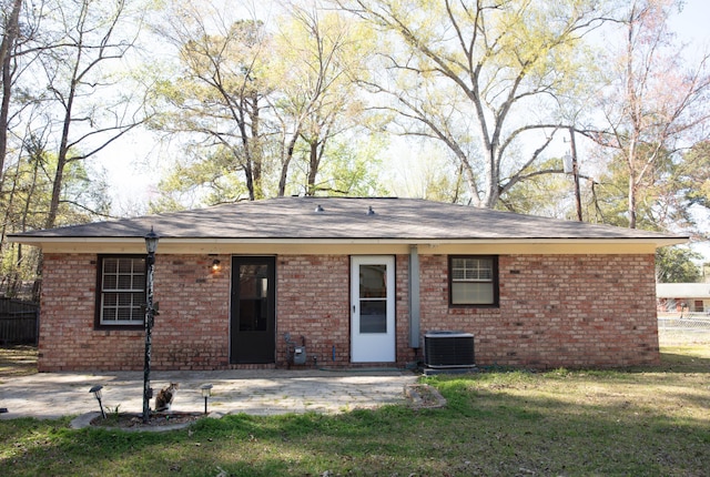208 Owens Dr, Summerville, SC 29485 - back of house with a yard, brick siding, a patio area, and fence