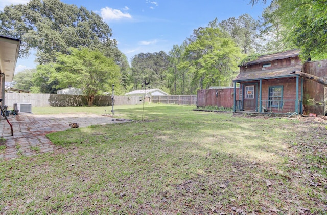 208 Owens Dr, Summerville, SC 29485 - view of yard featuring a fenced backyard, central AC unit, and a patio area