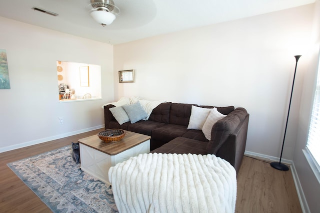 208 Owens Dr, Summerville, SC 29485 - living area featuring wood finished floors, ceiling fan, baseboards, and visible vents