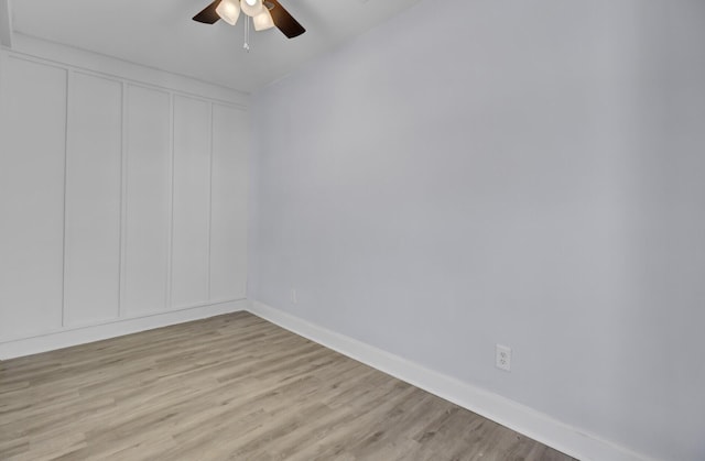 unfurnished room with ceiling fan and light hardwood / wood-style floors