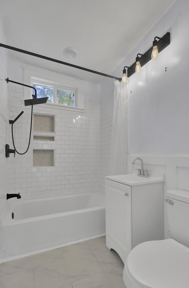 full bathroom with shower / bathtub combination with curtain, vanity, and toilet