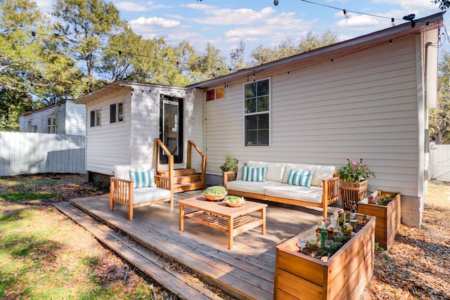 deck with an outdoor living space