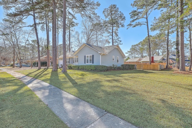 view of front of home featuring a front yard