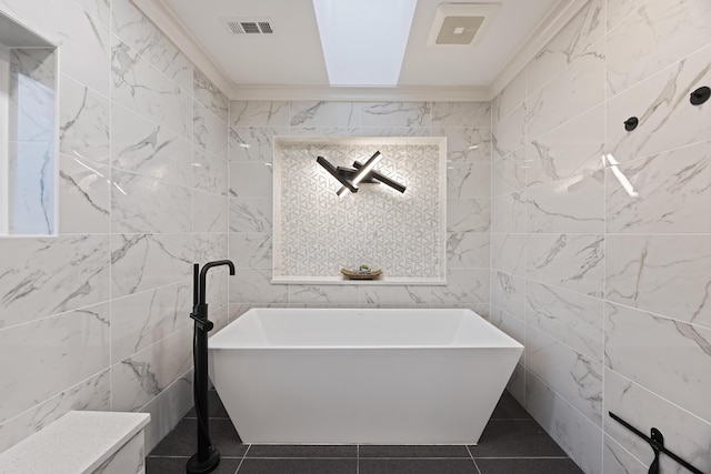 bathroom with tile walls and ornamental molding