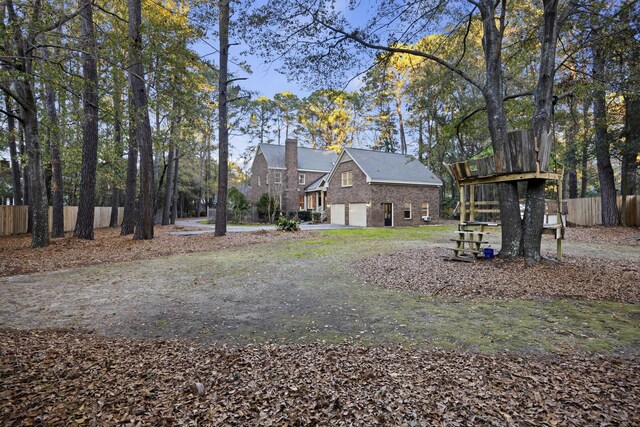 view of yard with a garage