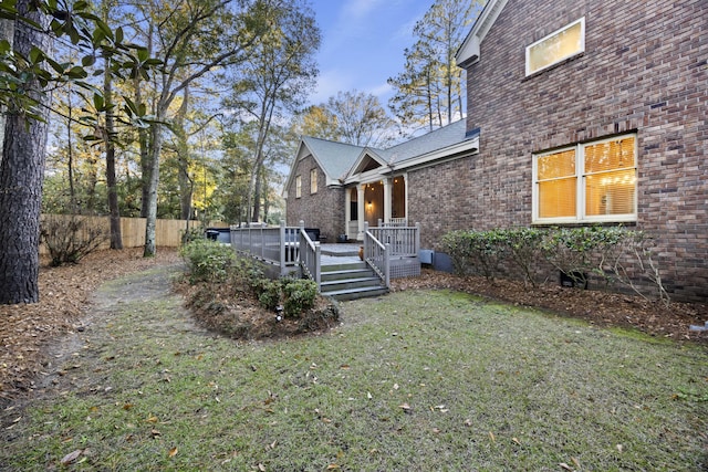 view of yard featuring a wooden deck