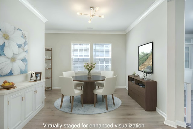 dining room featuring light wood-style flooring, an inviting chandelier, ornamental molding, and visible vents