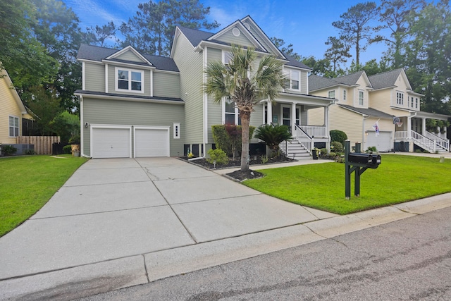 view of front of home featuring a garage, covered porch, and a front yard