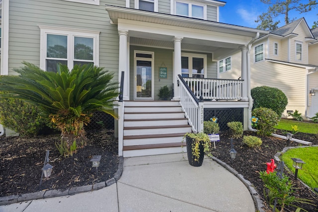 property entrance with a porch