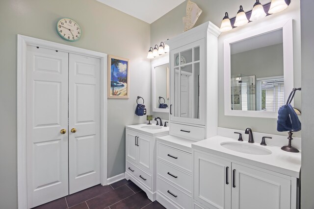 bathroom with vanity and tile patterned floors