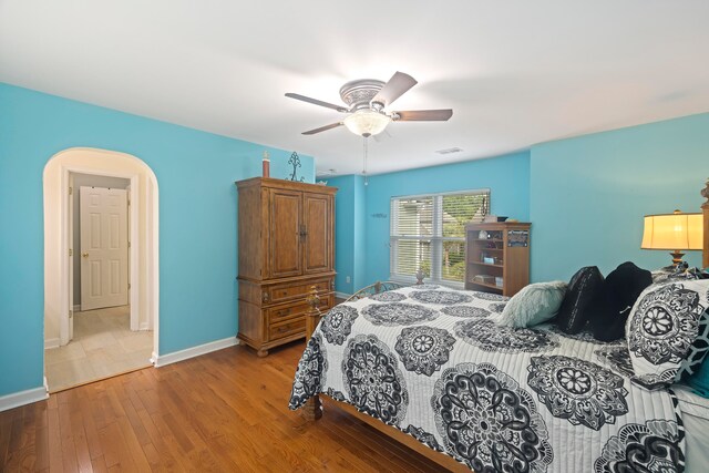 bedroom featuring ceiling fan and light wood-type flooring