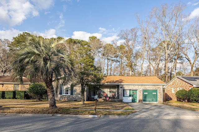 ranch-style home with a garage